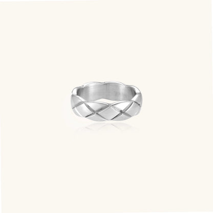 Braided stainless steel band ring with geometric interwoven strands in brushed silver finish on white background
